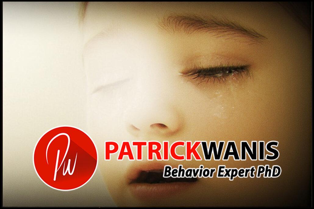 Young child's face in pain and suffering